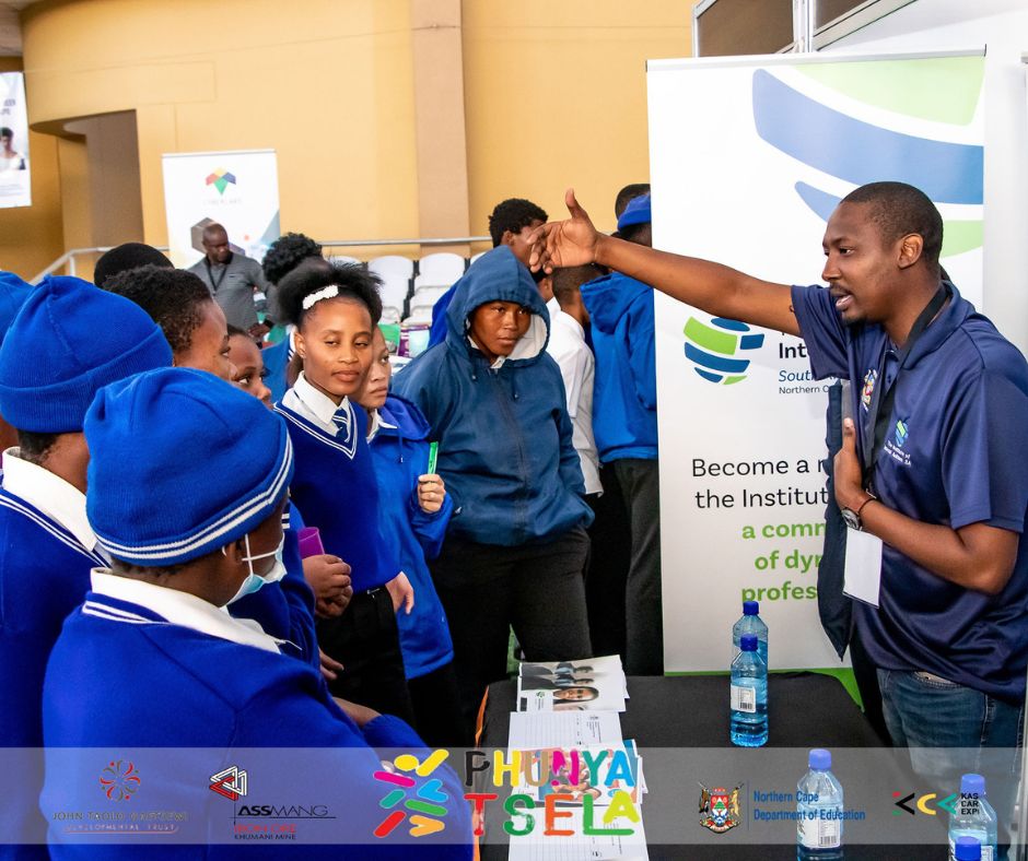 Learners engaging with exhibitors